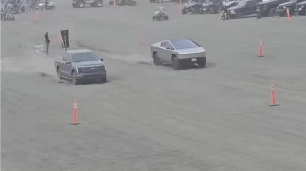 ford f-150 lightning vs tesla cybertruck: l’esito inatteso della drag race sulla sabbia | video
